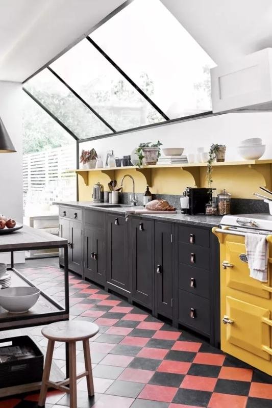 Yellow, Black, and Red - dark color kitchen cabinets